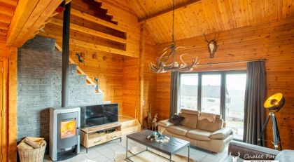 Chalet Faro Durbuy - gezellige living met haardvuur en TV