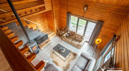 Chalet Faro Durbuy - gezellige living met haardvuur en TV